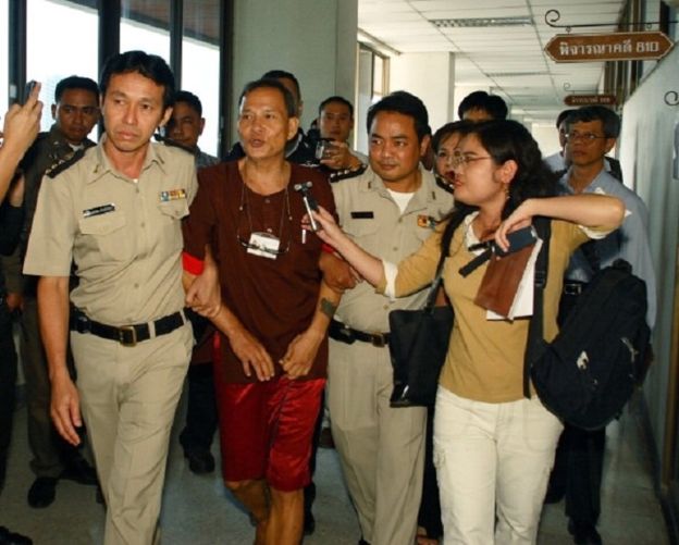 Lý Tống, 58 tuổi, được đưa từ nhà tù Thái Lan ra toà án, tháng 9-2006 