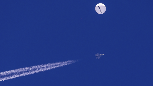 A large balloon drifts above the Atlantic Ocean, just off the coast of South Carolina-04022023